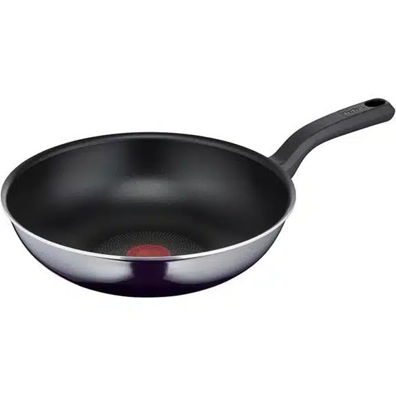 Die 10 besten Woks, mit denen Sie aus Pfannengerichten Gerichte in Restaurantqualität zaubern können 5 Tefal 28 cm Resist Titanium Antihaft-Wokpfanne